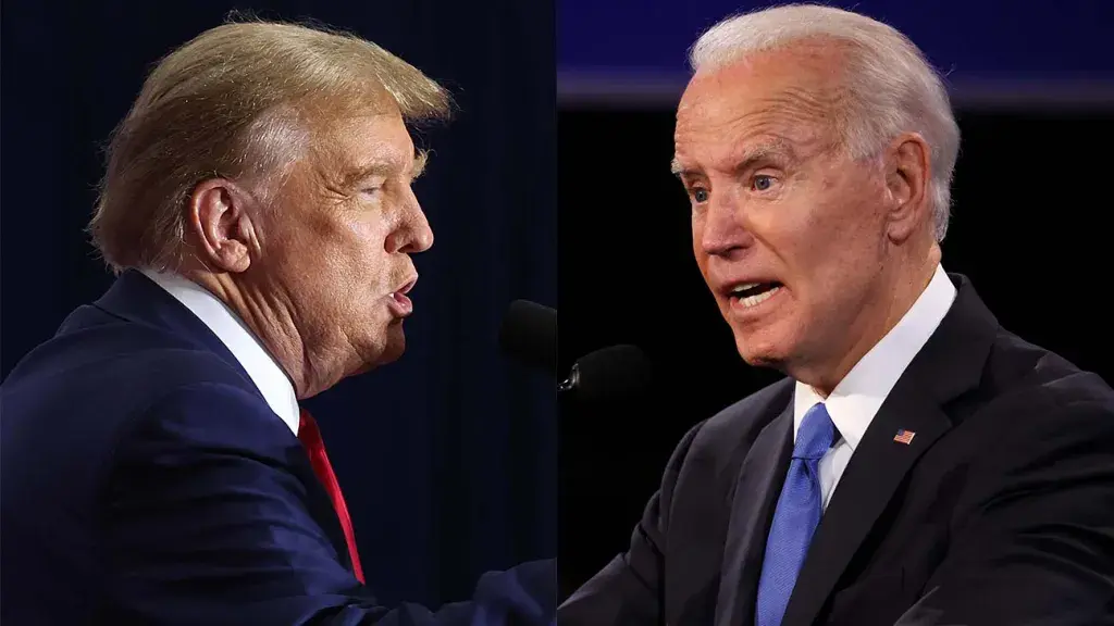 Biden and Trump, each with determined expressions, preparing to engage in verbal combat on the debate stage.